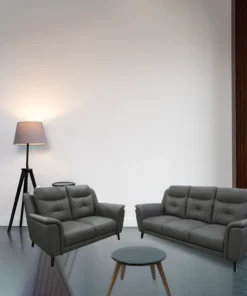 Stylish 2 seater lounge leather featuring side pillow arms, dark walnut timber legs, and premium leather for a sleek, contemporary design.