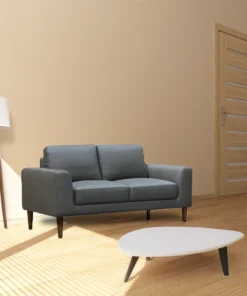 Contemporary 2-seater lounge featuring premium leather, fixed cushions, and mid oak legs for stylish, versatile living spaces.