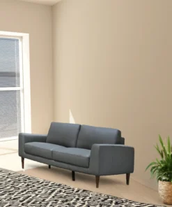 Contemporary leather 3-seater lounge featuring full leather upholstery, mid oak legs, and versatile configurations for stylish living spaces.