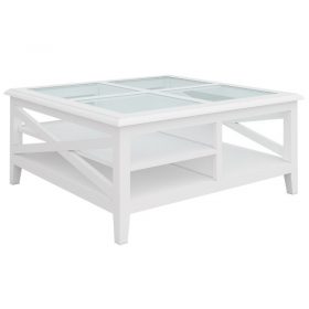Acacia square coffee table with tempered glass top and silver handles, set in a coastal-inspired living room.