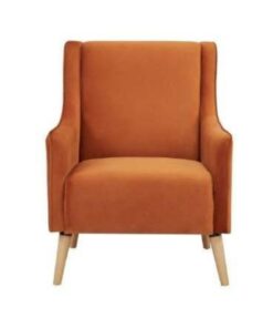 Polyester-upholstered armchair with plywood frame and timber legs, set in a trendy room.