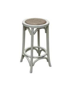 Versatile Baker Stool with oak and metal design, displayed in a stylish living room.