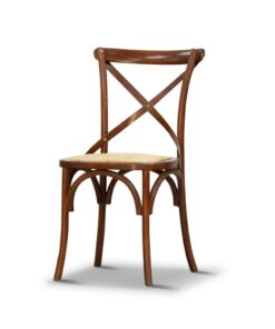 Timber dining chair with cross back design, displayed in a stylish kitchen space.