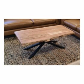 Live edge acacia coffee table with black steel legs and natural grain, set in a contemporary living room.