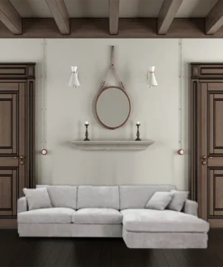 Licorice Brody Fab 2.5 Seater with RHF Chaise, featuring sleek arms and polyester fabric, in a stylish space.