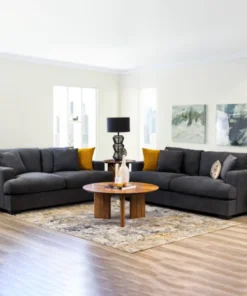 Dark Grey Hasting 2.5 + 2 Seater Sofa with low-profile design and polyester fabric, set in a stylish space.