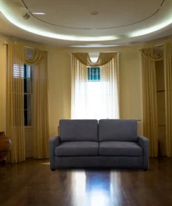 Loft Nouget Zoe Double Sofa Bed with loose cushions and bi-fold mechanism, in a cozy space.