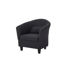 Polyester-upholstered armchair with plywood frame and timber legs, set in a contemporary room.
