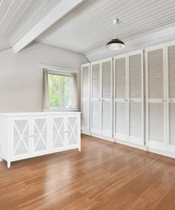 Hampton Buffet with tempered glass and metal runners, displayed in a stylish modern living space.