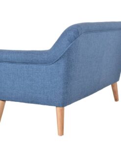 Green Lavender 2.5 Seater with slanted arms and classic design, set on oak legs in a cozy corner.