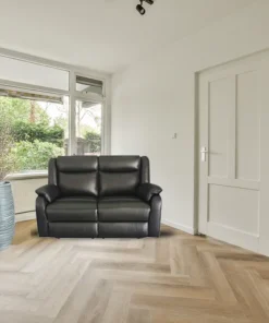 Marine Blue Peggy 2ERER LTH Recliner with electric recliners and lumbar support, in a stylish lounge.