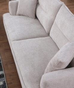 Beige Lydia Lounge with sophisticated charm, set in a contemporary lounge space.